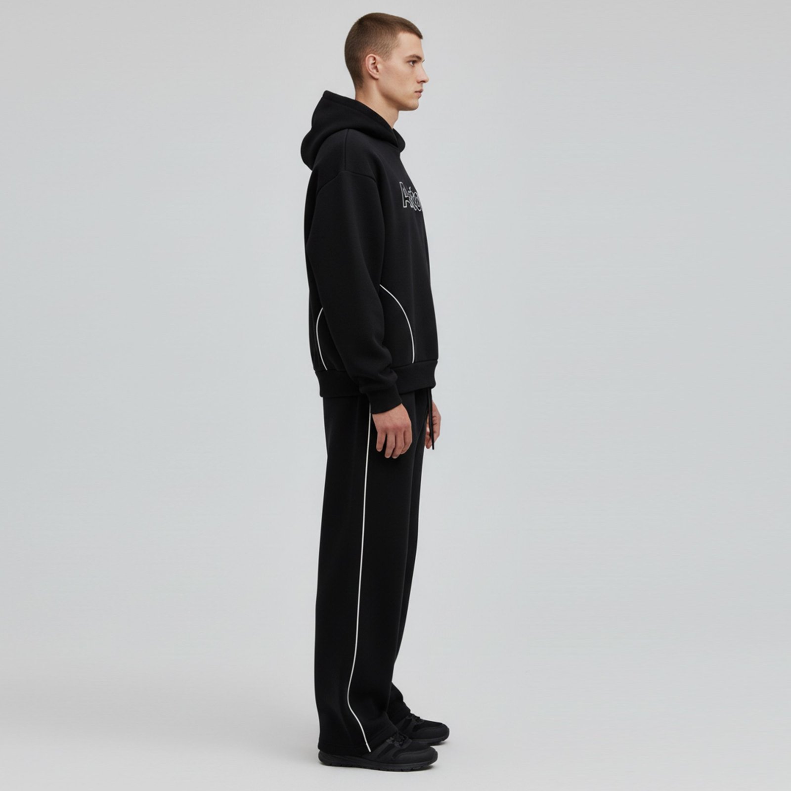Sleek Black Drop-Shoulder Hooded Tracksuit with White Piped Contrast - Image 2