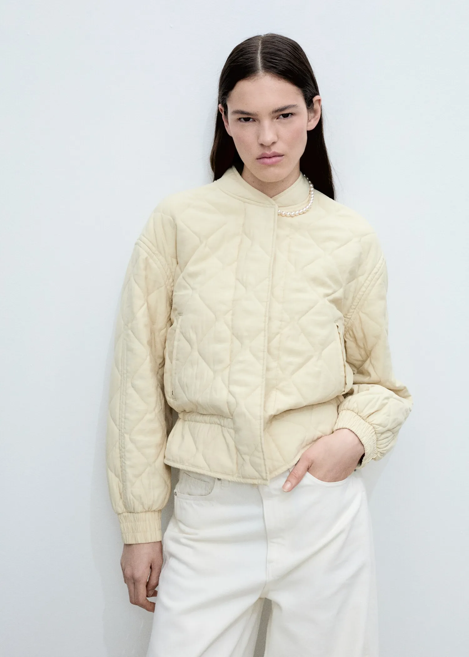 Elegant Cream Quilted Bomber Jacket – Luxe Texture and Classic Ribbed Hem